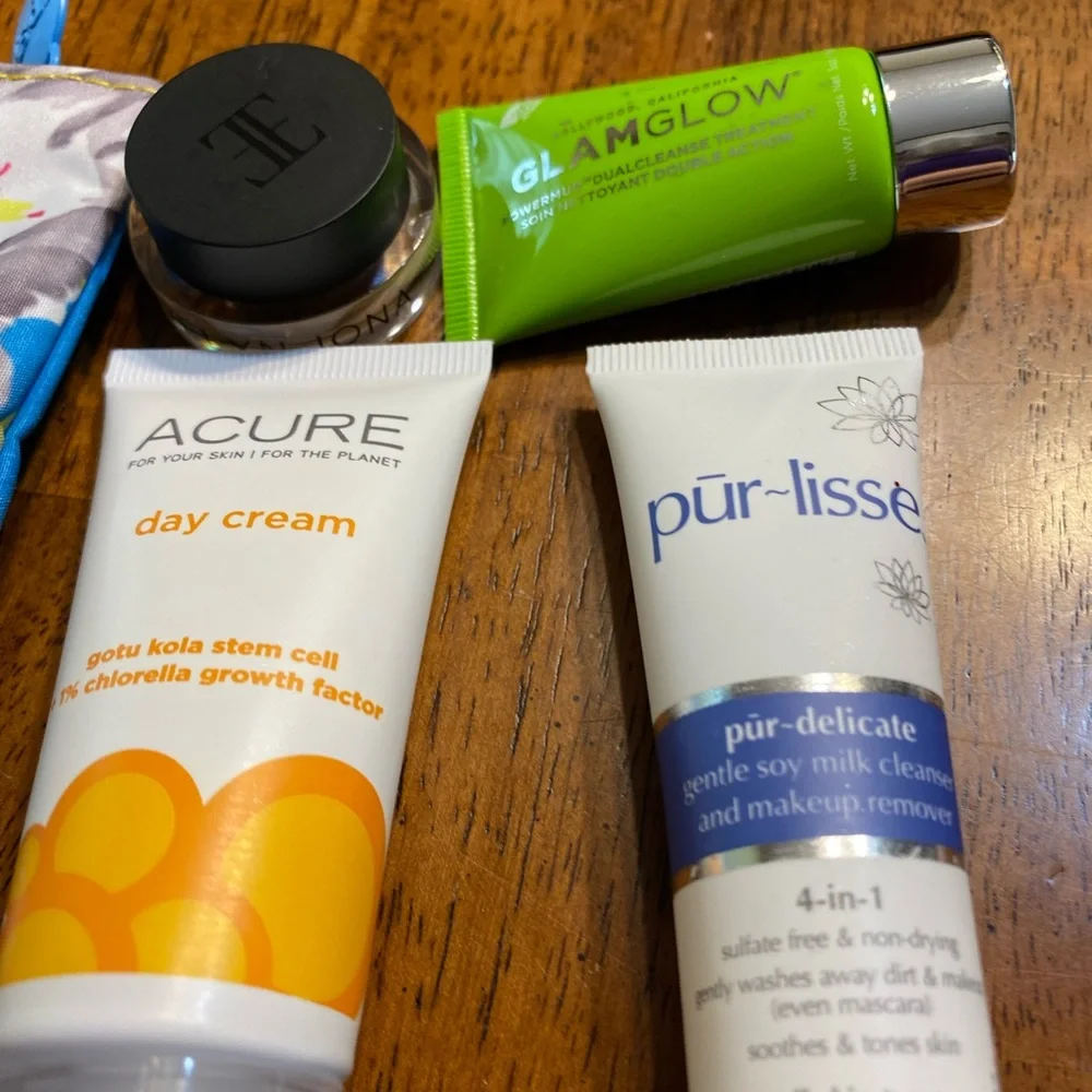 Ipsy makeup bags (3) with 14 different products. New, never opened.